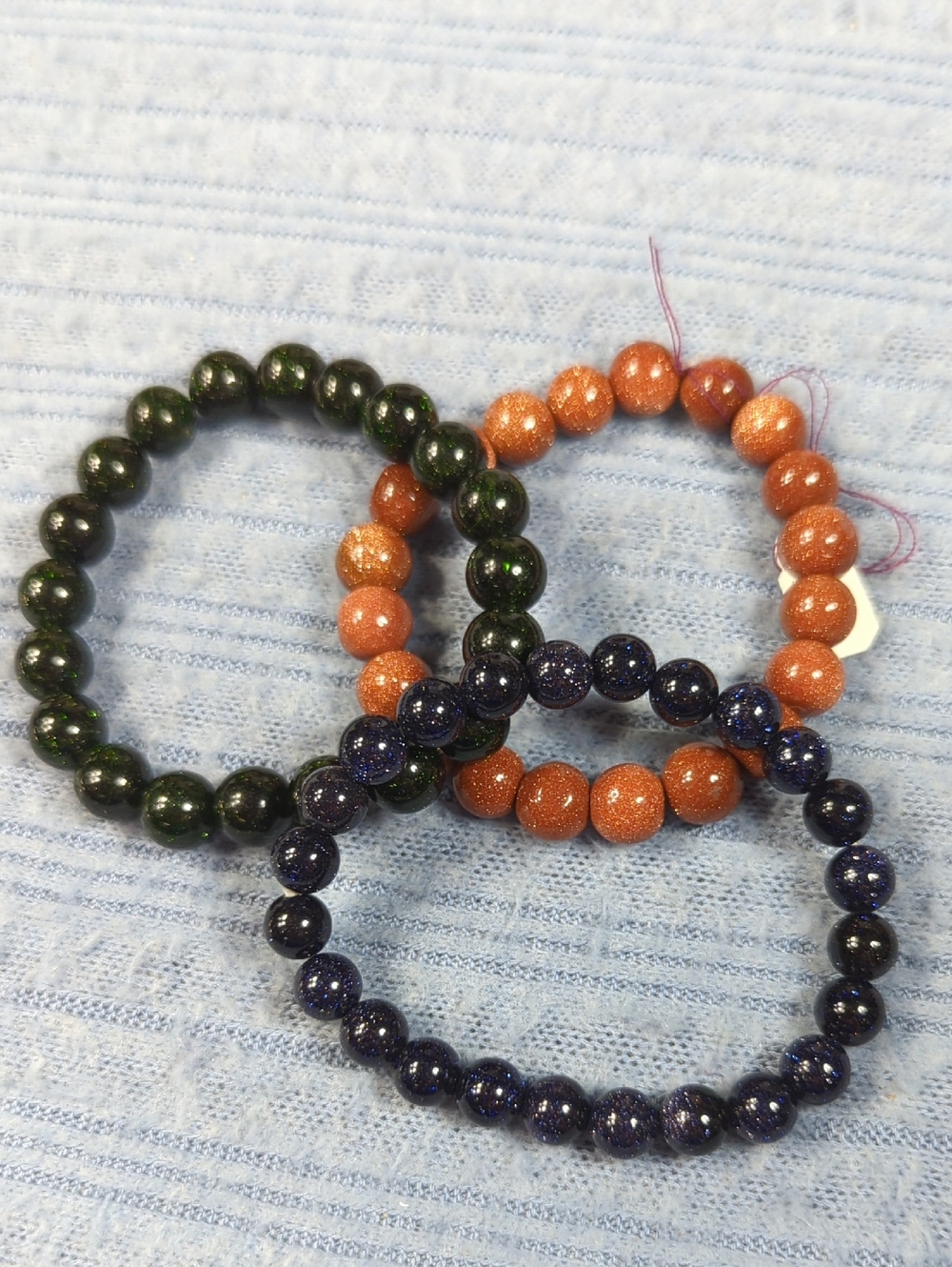 Red, Blue and Green Goldstone Bracelets